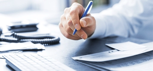 Photo of a person working at a desk