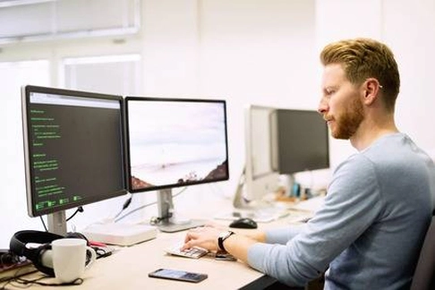 Customer Service operator at a computer